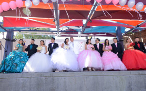 Quinceanera, quince, Chambelan, chambelanes, quince girl, 15th birthday, Quinceanera.com, black Monterey tuxedo, classic black tuxedo, tuxedo with notch lapel chambelan outfit, chambelanes outfit, black Lorenzo tuxedo, tuxedo with shawl lapel, what to dress your chambelanes in, black desire tuxedo, Michael kors tuxedo, white Casablanca dinner jacket, Spanish culture, Spanish tradition, birthday celebration, quince girls on stage