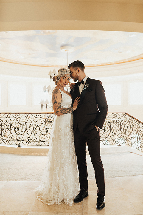 dana-point-outdoor-wedding-shoot-at-monarch-beach-resort-bride-and-groom-standing-and-hugging